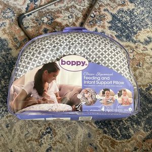 Boppy nursing pillow & additional organic cover